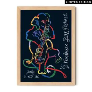 Dessin au trait coloré d'un éléphant jouant du saxophone avec le texte "Montreux Jazz Festival 30th July 5-20 96" sur fond sombre, dans un cadre en bois clair. Affiche Rolf Knie, 1996, Édition Limitée notée en haut à droite.