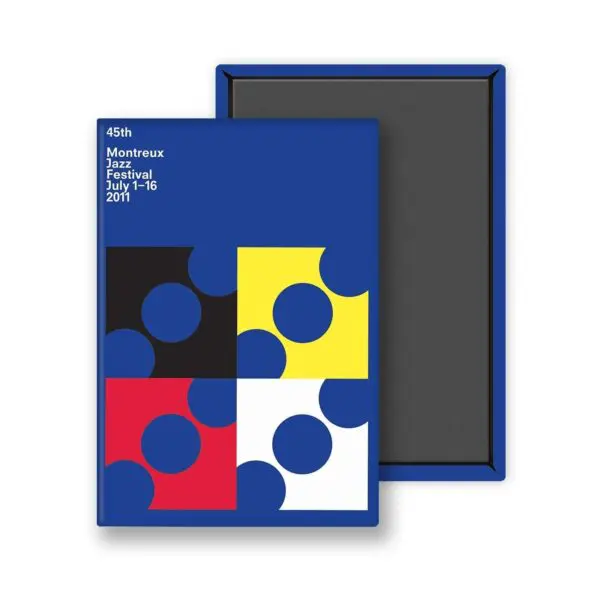 Un carnet à la couverture bleue présentant des formes géométriques abstraites et des cercles de Francis Baudevin, inspiré par le Magnet Francis Baudevin, 2011. La couverture porte la mention 45e Festival de Jazz de Montreux du 1er au 16 juillet 2011 ; le dos de la couverture est noir avec une bordure bleue.