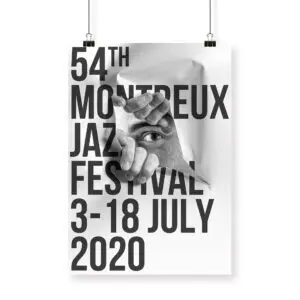 L'affiche JR, 2020 pour le 54e Festival de Jazz de Montreux (3-18 juillet 2020) présente un texte noir en gras sur l'image d'un œil et de mains apparaissant à travers un papier déchiré.